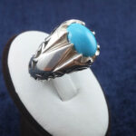 انگشتر نقره مردانه طرح دورچنگ دورشبکه با نگین فیروزه