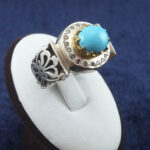 انگشتر نقره مردانه طرح طاووسی سه پر دو کله مخراجی با نگین فیروزه