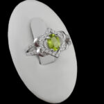 انگشتر نقره زنانه طرح سلاله با سنگ زبرجد