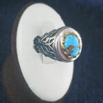 انگشتر نقره دست ساز مردانه طرح دور طلایی بهرام با سنگ فیروزه نیشابوری