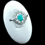 انگشتر نقره زنانه طرح گلستان با سنگ زمرد الماس تراش