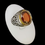 انگشتر نقره مردانه طرح دور طلایی بهمرد با سنگ گارنت الماس تراش