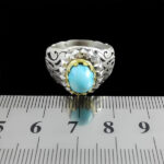 انگشتر نقره فیروزه نیشابوری دست ساز مردانه طرح دورطلایی آریاراد‌‌‌ - Image 4