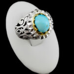 انگشتر نقره فیروزه نیشابوری دست ساز مردانه طرح دورطلایی آریاراد‌‌‌