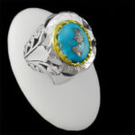 انگشتر نقره فیروزه نیشابوری دست ساز مردانه طرح دورطلایی ازشک‌‌‌