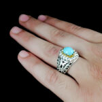 انگشتر نقره فیروزه نیشابوری دست ساز مردانه طرح دورطلایی علیسا‌‌‌ - Image 4