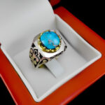 انگشتر فیروزه نیشابوری دست ساز فاخر نقره مردانه طرح دور طلایی هونام - Image 2