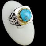 انگشتر فیروزه نیشابوری دست ساز فاخر نقره مردانه طرح دور طلایی هونام