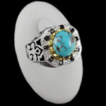 انگشتر فیروزه نیشابوری نقره دست ساز فاخر مردانه طرح دور طلایی سپهر