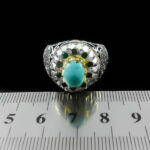 انگشتر فیروزه نیشابوری نقره دست ساز فاخر مردانه طرح دور طلایی رادمان - Image 2