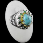 انگشتر فیروزه نیشابوری نقره دست ساز فاخر مردانه طرح دور طلایی راستین