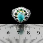 انگشتر فیروزه نیشابوری نقره دست ساز فاخر مردانه طرح دور طلایی راستین - Image 2