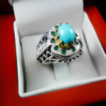 انگشتر فیروزه نیشابوری نقره دست ساز فاخر مردانه طرح دور طلایی رهاورد - Image 2