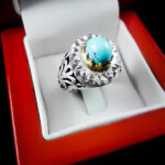 انگشتر فیروزه نیشابوری نقره دست ساز فاخر مردانه طرح دور طلایی فلاح