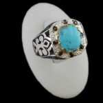 انگشتر فیروزه نیشابوری دست ساز فاخر نقره مردانه طرح دور طلایی برزو