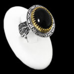 انگشتر عقیق مشکی نقره مردانه طرح دورطلایی ارسلان