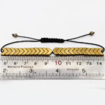 دستبند حدید صینی فانتزی دخترانه و پسرانه طرح فانتزی طلایی جهت - Image 4