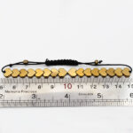 دستبند حدید صینی فانتزی دخترانه و پسرانه طرح فانتزی طلایی قلب - Image 3