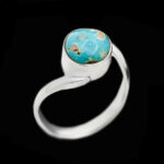 انگشتر فیروزه نیشابوری نقره دست ساز طرح برشید ۲ + حرز امام جواد (ع)